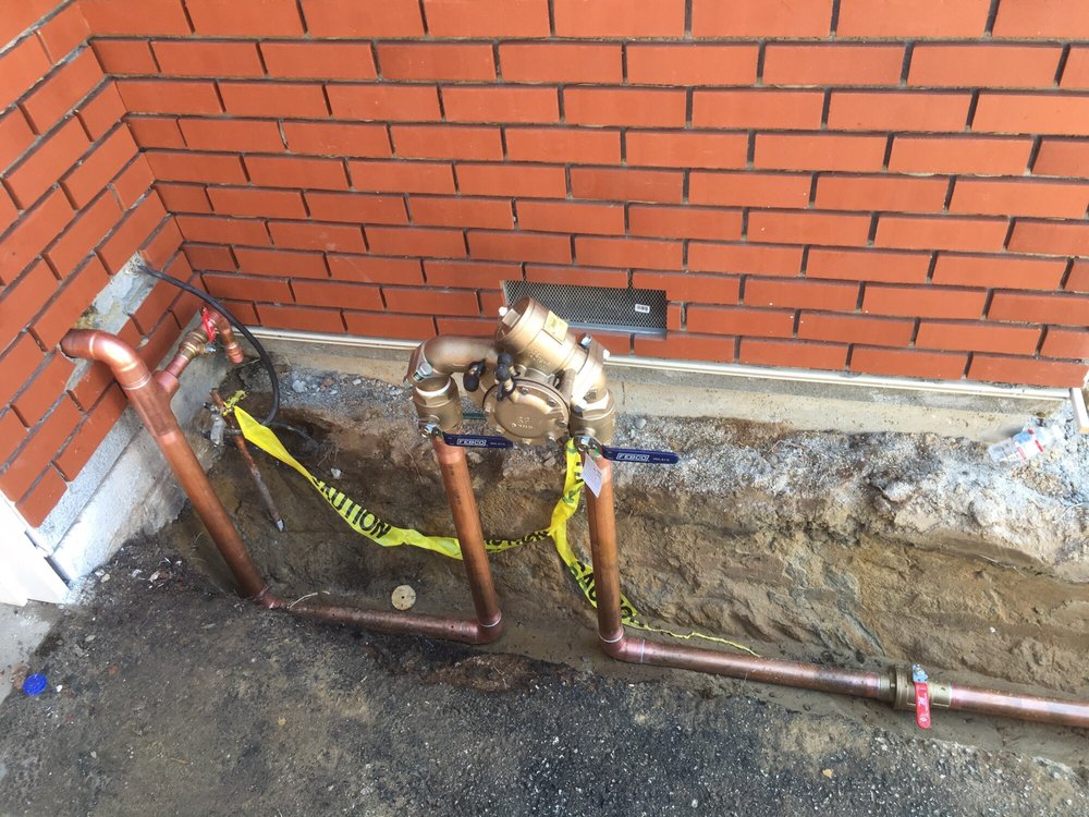 Backflow preventer testing and repair